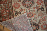 Distressed vintage Hamadan rug pile showing Karaja style medallions and intricate woven foundation.