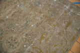 Distressed texture of Sivas carpet showing worn pile, exposed foundation, and soft floral motifs.