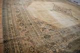 Distressed vintage Khorassan carpet border showing reciprocating pawn design and intricate inner panels.