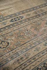 Vintage distressed Khorassan rug border, intricate pale navy pawn design on beige ground.
