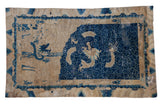 Distressed antique Peking rug with pictorial cobalt blue dragon scene and ivory cloud-wave border.