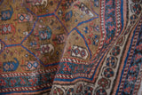 Fine hand-knotted pile of the antique Caucasian rug, displaying lattice boteh motifs in ecru, blue, and red.