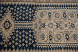 Distressed Malayer runner's navy geometric, beige Herati patterns, even wear.