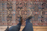 Distressed vintage Dargezine runner with thousand flower motif, rich abrashes in denim blue, terra cotta.