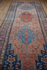 Low angle perspective showing the sharp serrated lightning contour of the Malayer rug runner.