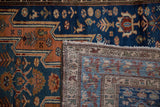 The fine hand-knotted weave visible on the reverse of a vintage Persian Malayer runner.