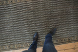 Distressed Anatolian runner pile with ivory, brown water design and foundation showing through.