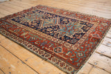 Vintage Karaja rug side showing madder red border, Samovar Turtle motif, original selvage.