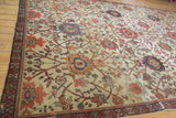Worn antique Mahal carpet section, foundation visible through low pile, terra cotta lotus and vinery.