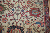 Antique Mahal carpet detail: ivory field with terra cotta vinery, blue-blush florals, visible foundation.