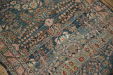 Distressed Dargezine runner detail with blush floral motif and foundation showing.