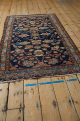 Corner of the Vintage Fine Mehreban rug, showing secure fringe and a patterned border in dusty rose, sky blue.
