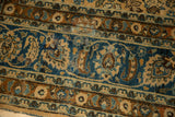 Distressed Meshed carpet detail, camel and sky blue floral vinery with foundation etching.