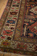 Antique Kuba rug detail: geometric field with tree-of-life and boteh patterns.