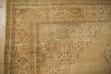 Distressed vintage Indian Tabriz design carpet corner: beige spandrel and turtle Samovar border.