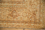 Curled edge and distressed corner of vintage Indian Tabriz rug, with turtle Samovar border.