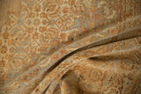 Distressed Indian Tabriz carpet showing even wear, soft copper, and beige color details.