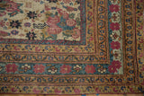 Mid-19th century Kerman rug corner detail: cochineal red golferang roses and patterned borders.