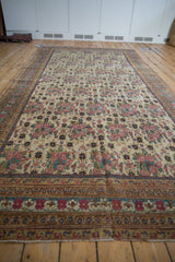 Antique Kerman runner's intricate golferang rose field and detailed multi-band border.