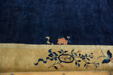 Vintage Chinese Peking carpet border featuring dusty gold and blue floral vinery.