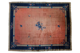Lustrous vintage Peking carpet, peach field, cobalt blue borders with floral design, circa 1920s.