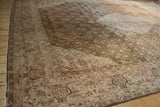Distressed Tabriz rug corner with Herati design in coffee brown and dusty blush.