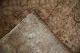 Detail of hand-knotted foundation and distressed pile of vintage Tabriz carpet.