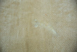 Ivory and beige geometric maze motif on a vintage Peking carpet, with treated areas.