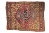 Antique Halvai Bijar rug: asymmetric navy medallion, cherry red field, saffron spandrels, green borders, wear.