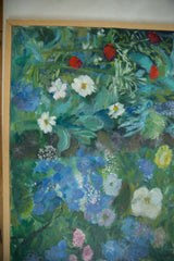 Close-up of textured blue, white, and purple flowers with green leaves.