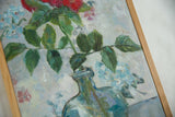 Painting showing blue vase base, pale blue background brushstrokes, and light wood frame.