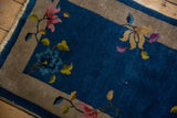 Fringe, sapphire blue field, and oxidized silver border with delicate blossoms.