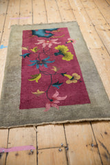 Art Deco runner's burgundy field with pink, blue, lime floral blossoms and grey border.
