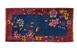 Vintage Nichols Art Deco rug runner, indigo blue field, burgundy border, expressive floral vines.