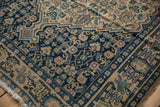 Antique Senneh rug's navy Herati pattern with finned geometric border and worn pile.