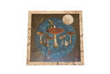 Dreamscape mixed media art with moon, red mushroom, figures, and distressed frame.