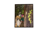 Ashkenazi Heritage mixed media art with woman in purple, old graveyard, dark building, green ivy.