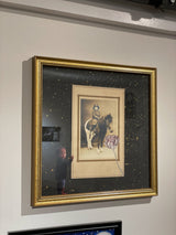 Angled view of Reaching Through Time art, detailing the gold frame and layered photo collage.