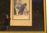 Close view of mixed media art with a vintage photo, a toddler cutout, and a tulip.
