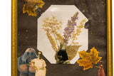 Mixed media art collage with a painted golem, vintage portraits, and dried flowers.