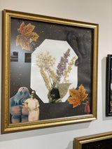 Angled view of The Wildflower & The Golem mixed media art, showing its gold frame and composition.