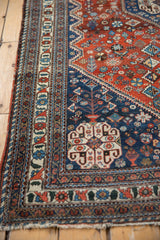 Corner detail of a fine Abadeh rug showing complex borders and a serrated medallion outline.