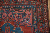 Detailed texture of the short pile and Herati border on a vintage hand-knotted Kurdish Bijar rug.