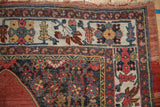 Antique Halvai Bijar rug corner: ivory spandrel, palmette and geometric borders in ruby, sapphire, saffron.