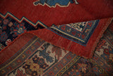 Detail of antique Halvai Bijar runner's hand-knotted foundation and ruby red border design.