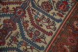 Low pile texture on an antique Malayer rug showing serrated leaf and Herati border details.