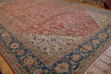 Vintage Sultanabad carpet corner with sapphire blue Herati floral border and ivory spandrel.