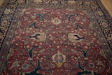 Angled perspective of a fine Tabriz carpet's expressive floral arabesques and palmettes.