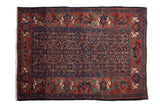 Vintage Bijar rug, hand-knotted, dusty navy Herati field, brick red antlered animal border.