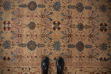 Vintage Bibikabad carpet field, camel, with sapphire blue, rose floral, serrated boteh and vine patterns.